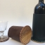 Porta bottiglie in olivo scolpito e cuoio Jane Harman Restauratore Firenze